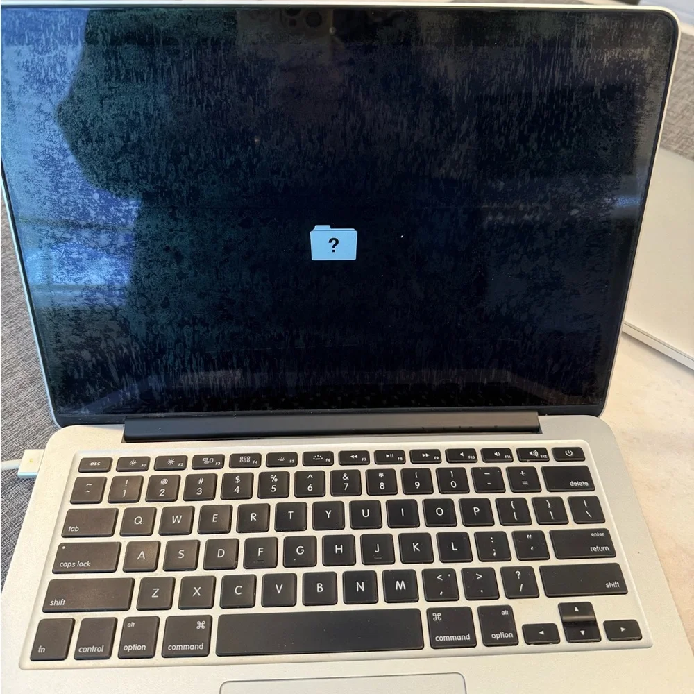 Apple Silver MacBook Pro with Black Keyboard